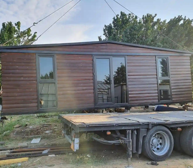 ხის კოტეჯის ტრანსპორტირების დაწყება
